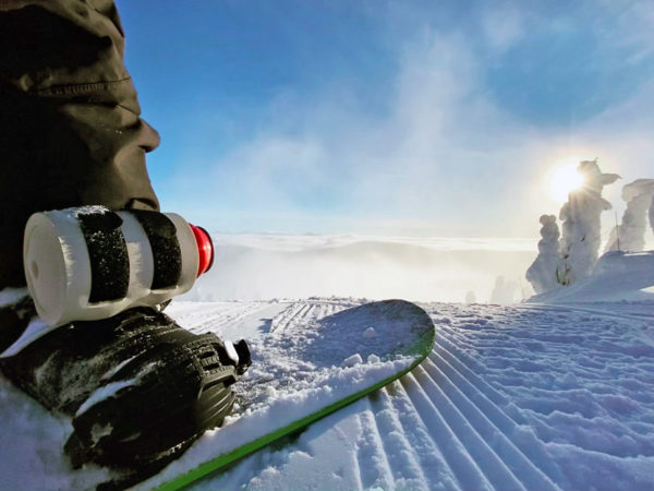 Attach a beer to a snowboard