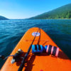Beer cans strapped to paddle board