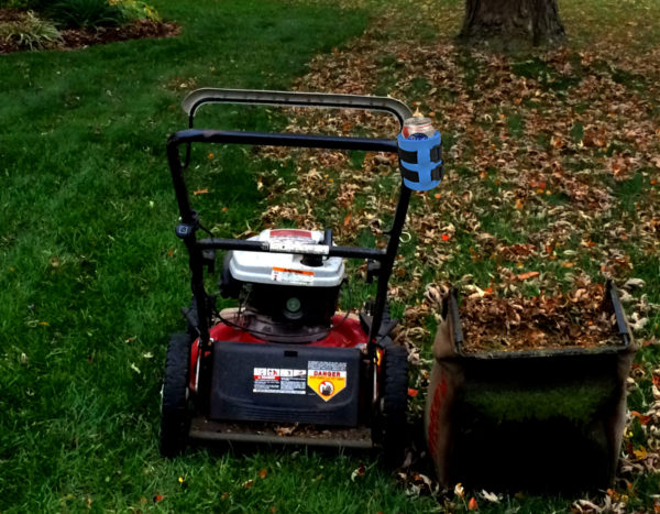 Lawn mower beer holder